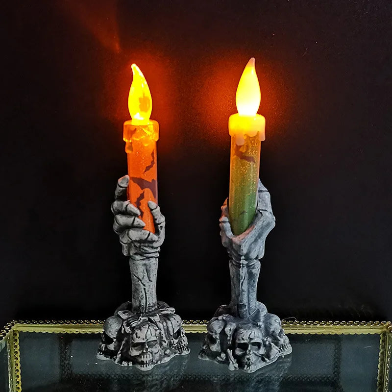 Halloween skeleton hand candle holders with candles for spooky gothic party and home decor