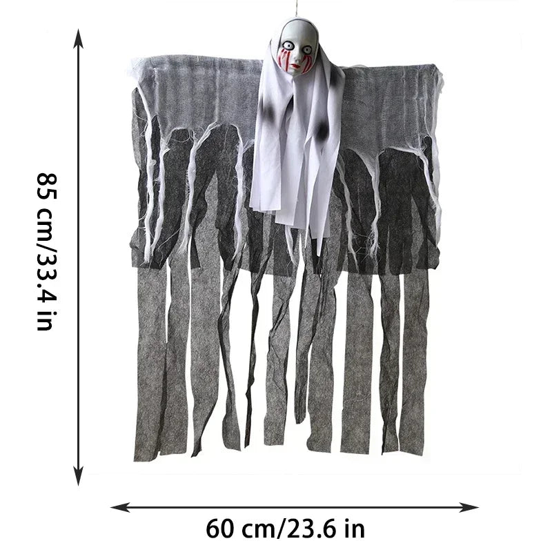 A Halloween hanging decoration featuring a creepy clown face mask above a tattered gray and white fabric body, shown with dimension arrows and text indicating 85 cm height and 60 cm width on a white background.