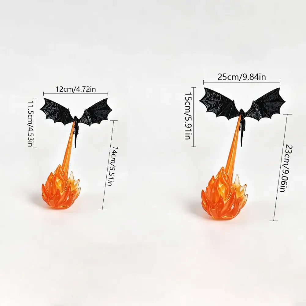 A small fantasy dragon figurine with black wings and an orange flame base, shown on a white background with dimension labels for width and height.