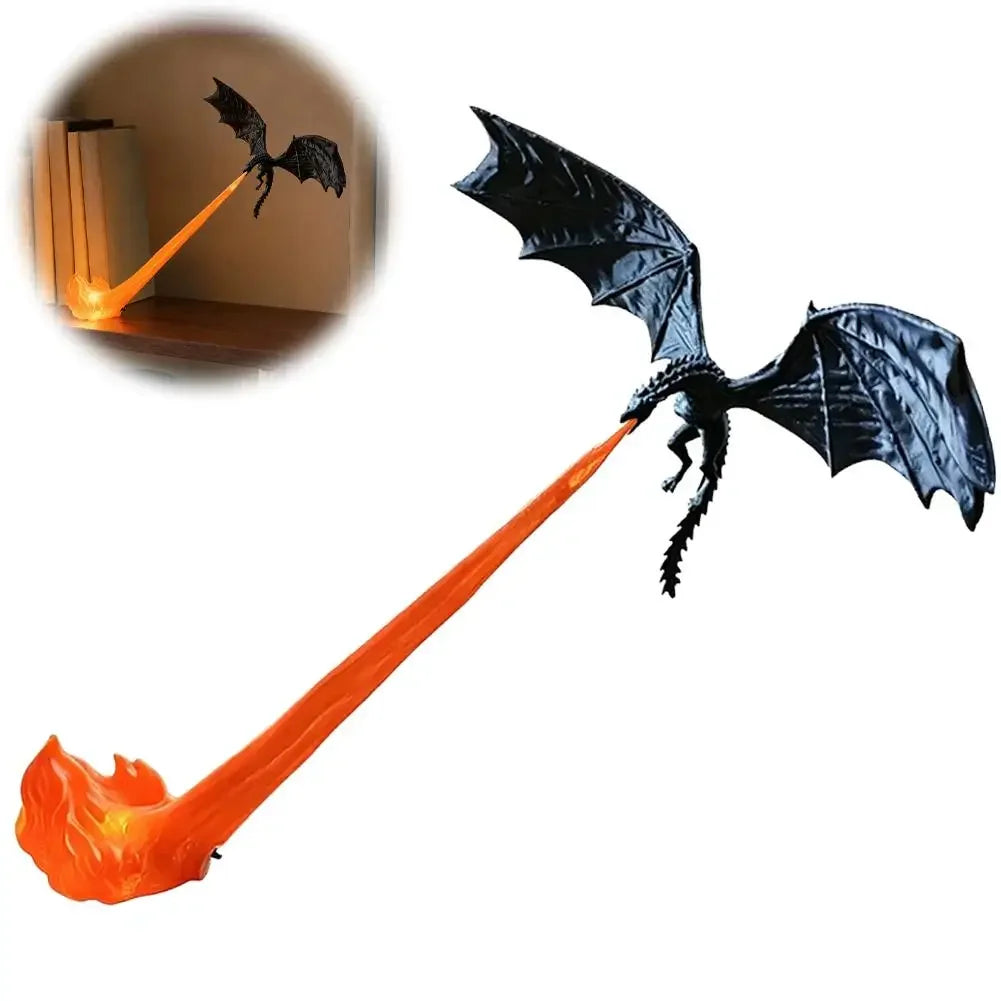 A black dragon toy or decoration with spread wings and a long orange flame-like tail, shown on a white background. A small inset circle in the upper left shows the dragon casting an orange beam like a laser or fire breath.