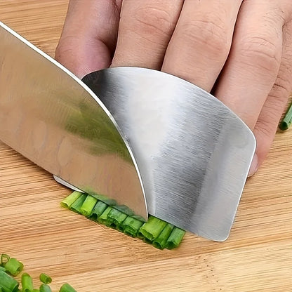 Stainless Steel Finger Guard for safe vegetable slicing, protecting fingers while cutting fruits and vegetables with knives in the kitchen.
