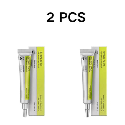 Two skincare product tubes with yellow labels on a white background