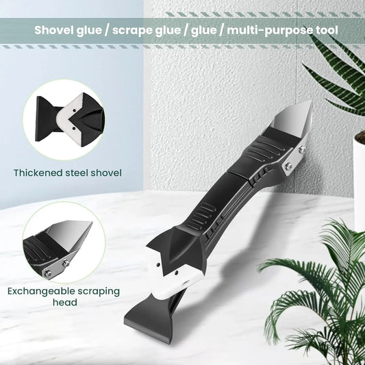 Multi-purpose tool with interchangeable scraping head on a white surface with plants.