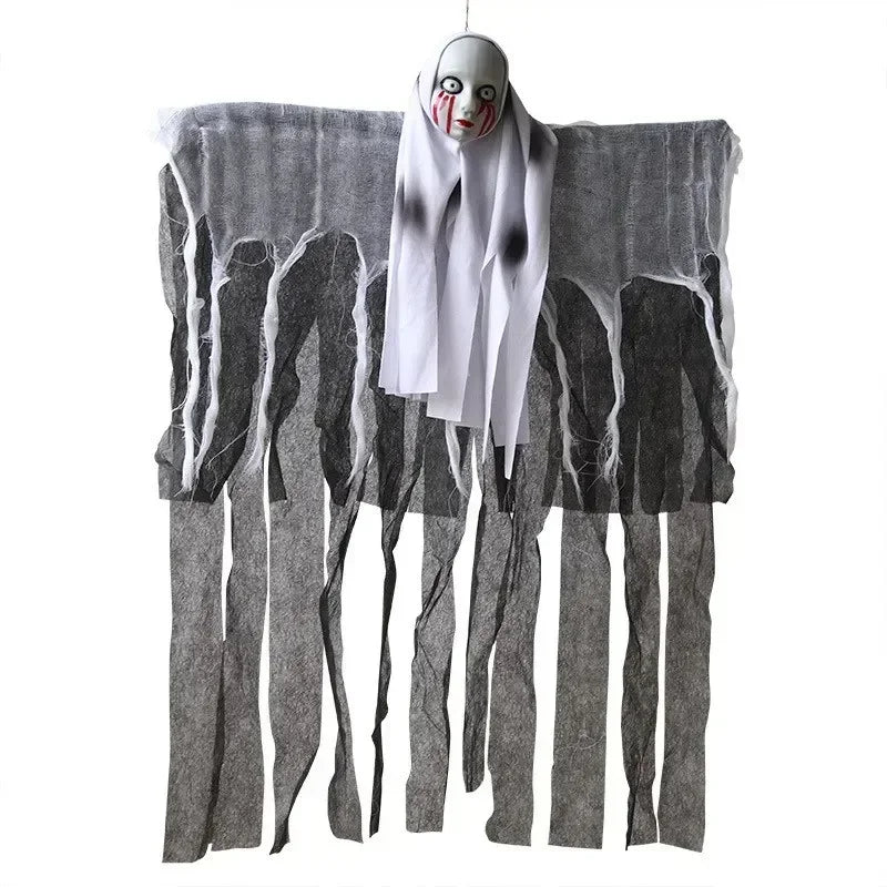 Hanging ghost decoration with a face on a white background
