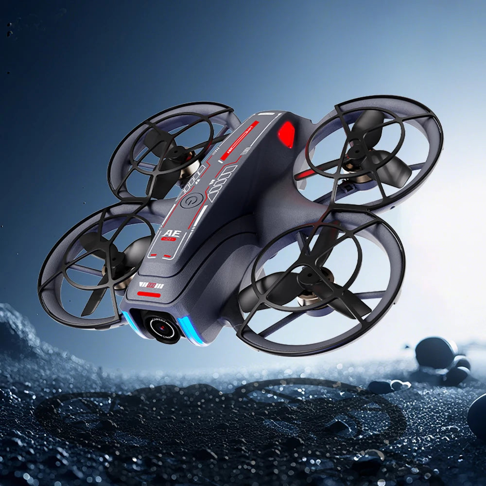 Black and gray drone with red accents flying over a water surface