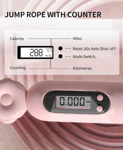 Pink jump rope with digital counter displaying calories and miles on a white background.