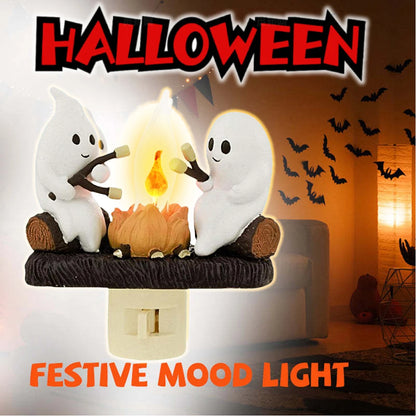 Ghost campfire flickering night light with warm LED glow effect for decorative Halloween ambiance and cozy indoor lighting.